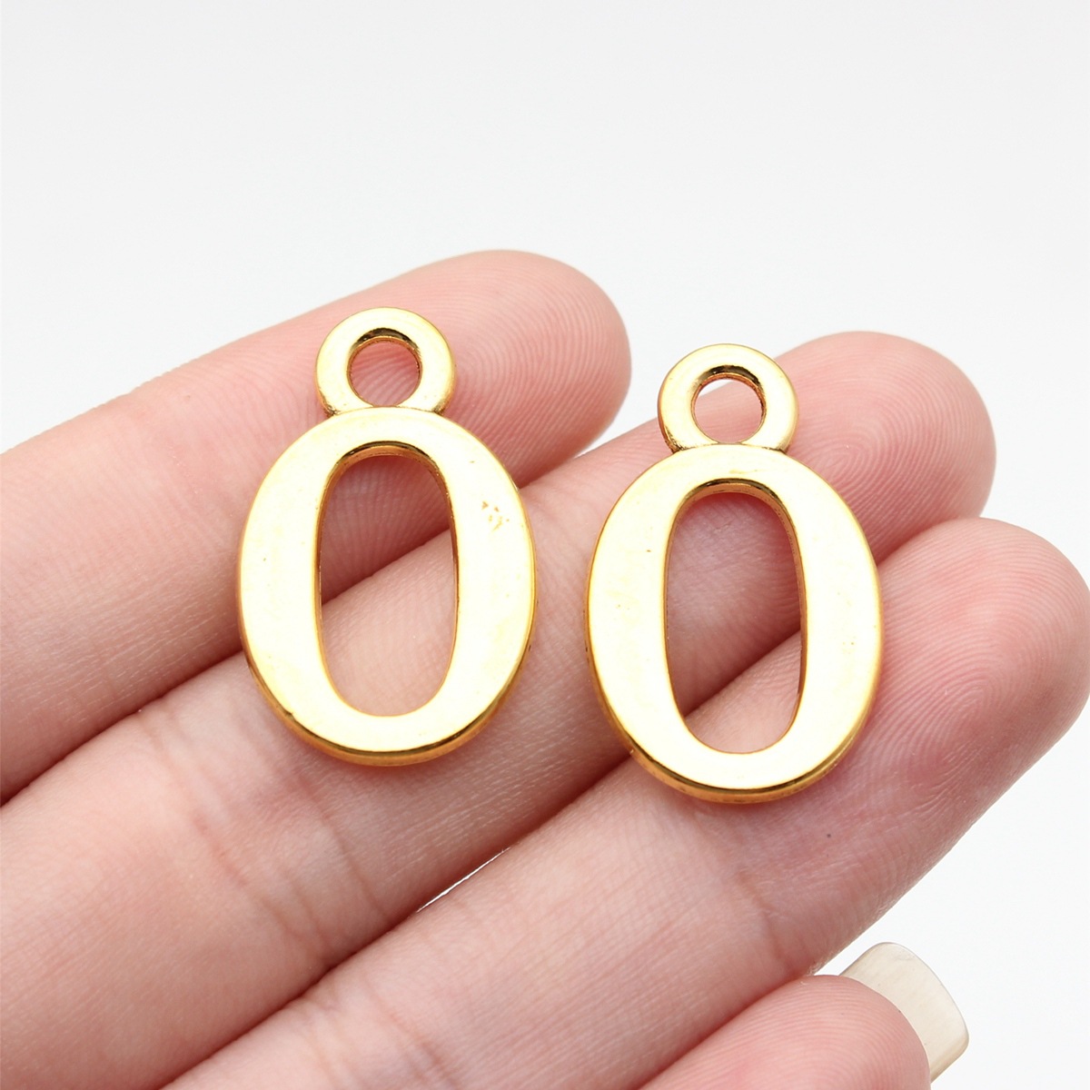 Vintage Fashion Stores - 10 stuks 26x16mm antiek goudkleurig nummer